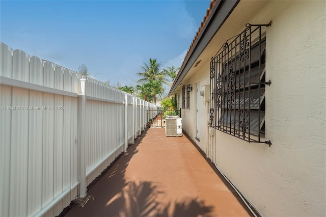 view of side of property featuring central AC unit