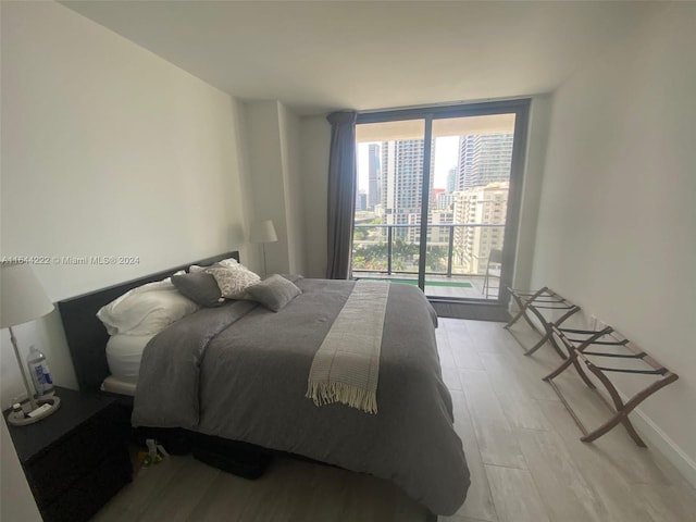 bedroom featuring light hardwood / wood-style floors