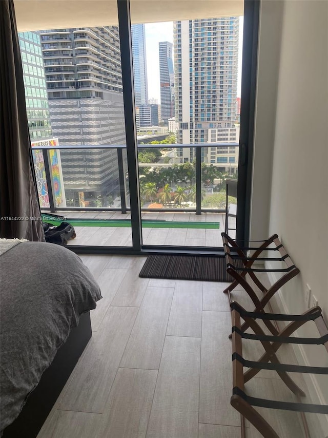 bedroom with light hardwood / wood-style floors