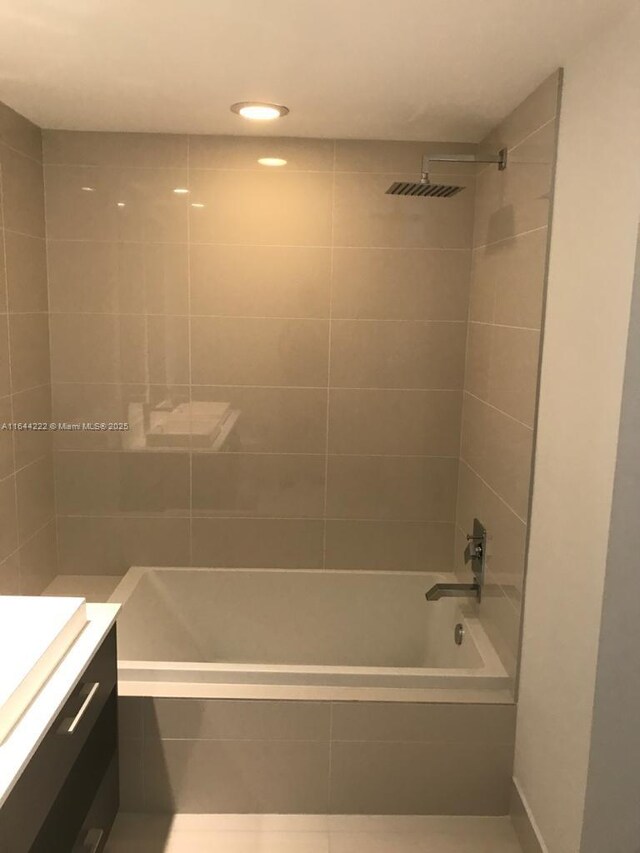45 SW 9th St Unit 1005, Miami, FL 33130 - bathroom featuring vanity and tiled shower / bath