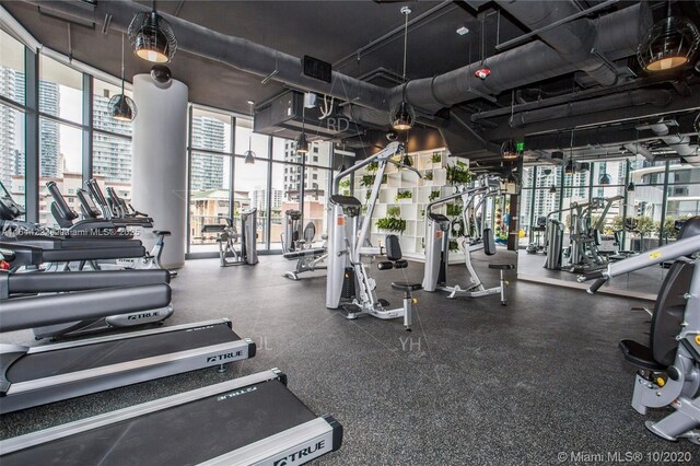 45 SW 9th St Unit 1005, Miami, FL 33130 - exercise room featuring expansive windows