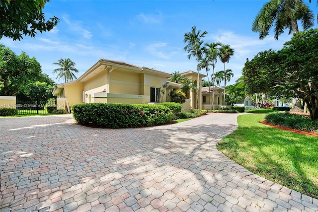 view of front of property with a front lawn