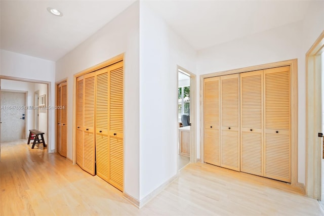 corridor featuring light wood-type flooring