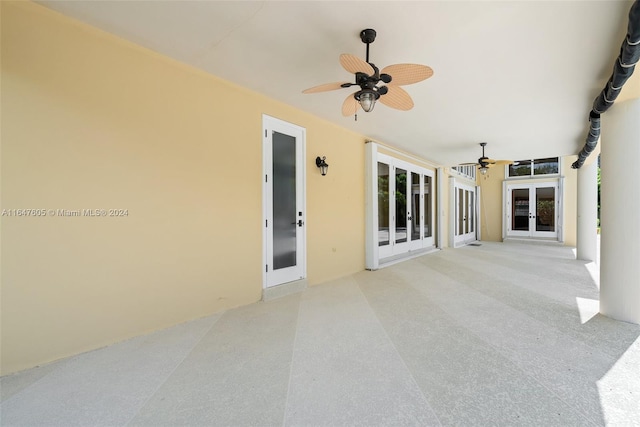 view of patio / terrace featuring ceiling fan and french doors