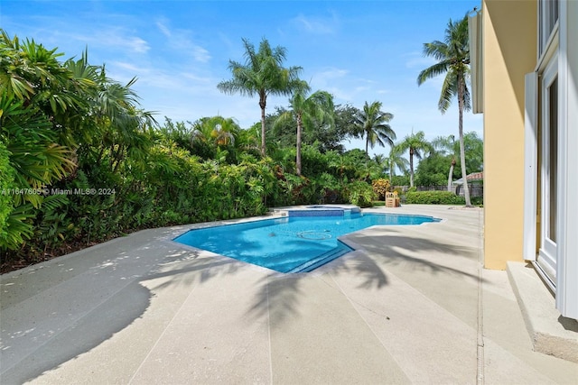 view of pool with a patio area