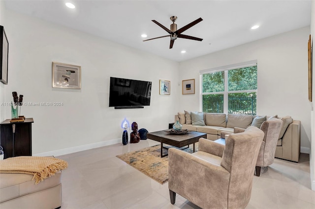 tiled living room featuring ceiling fan