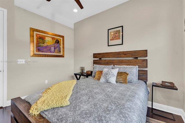 bedroom with dark wood-type flooring and ceiling fan