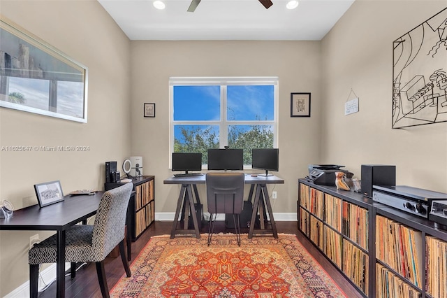 office area featuring dark wood-type flooring and ceiling fan