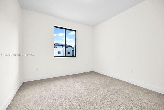 empty room featuring carpet