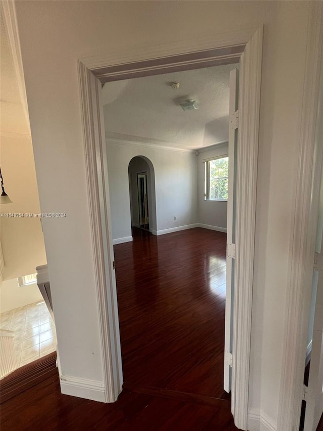 hall with dark hardwood / wood-style flooring