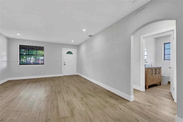 foyer with light hardwood / wood-style flooring