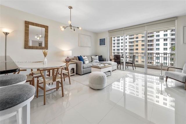 living room featuring floor to ceiling windows, a notable chandelier, and light tile patterned floors