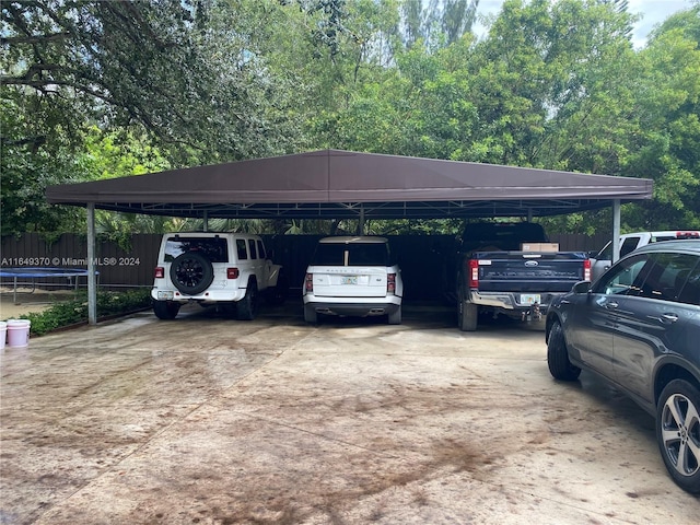 24490 SW 120th Ave, Homestead, FL 33032 - view of parking with a carport and concrete driveway