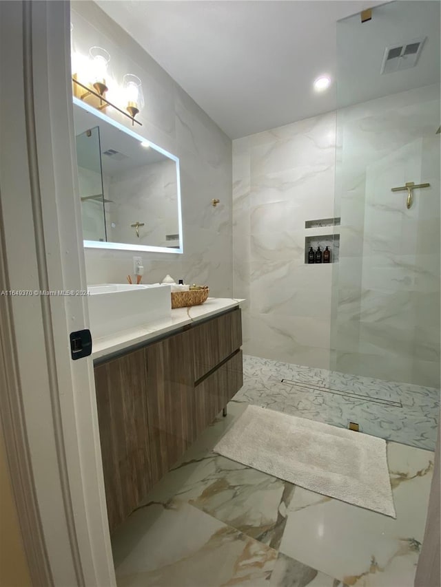 24490 SW 120th Ave, Homestead, FL 33032 - bathroom featuring marble finish floors, a marble finish shower, vanity, and recessed lighting