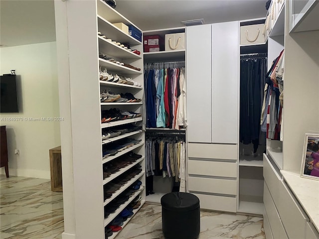 24490 SW 120th Ave, Homestead, FL 33032 - walk in closet with light marble finish flooring