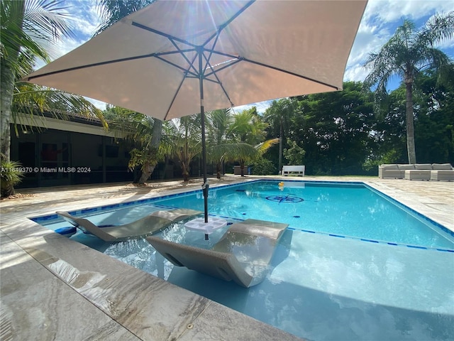 24490 SW 120th Ave, Homestead, FL 33032 - outdoor pool featuring a patio area