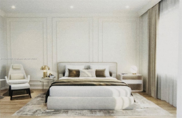 bedroom featuring light wood-type flooring