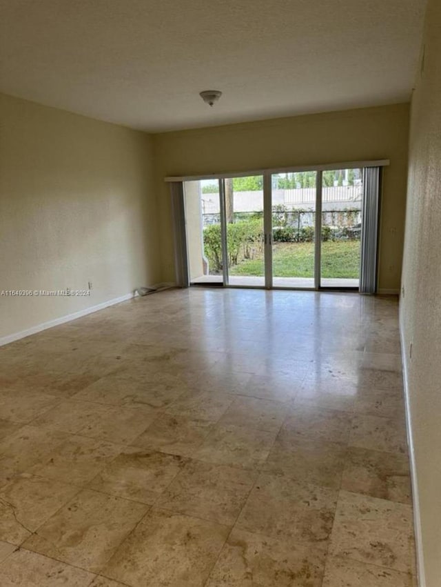 view of tiled empty room