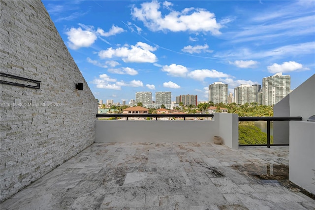 view of patio with a balcony