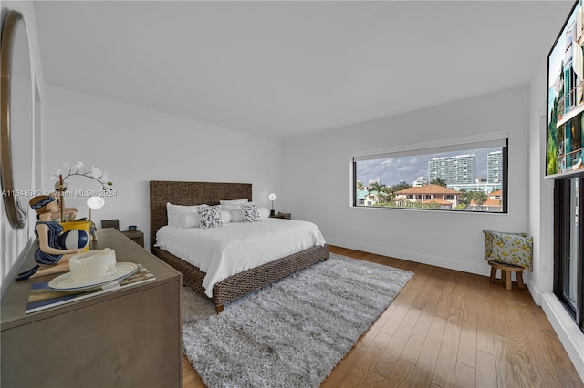 bedroom featuring hardwood / wood-style flooring