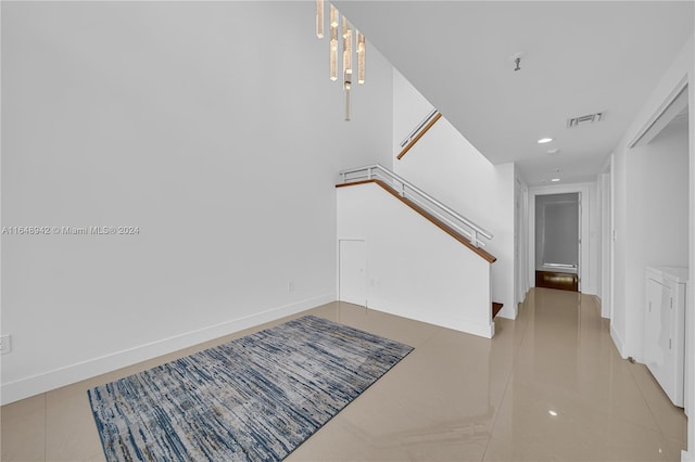 entrance foyer with light tile patterned flooring