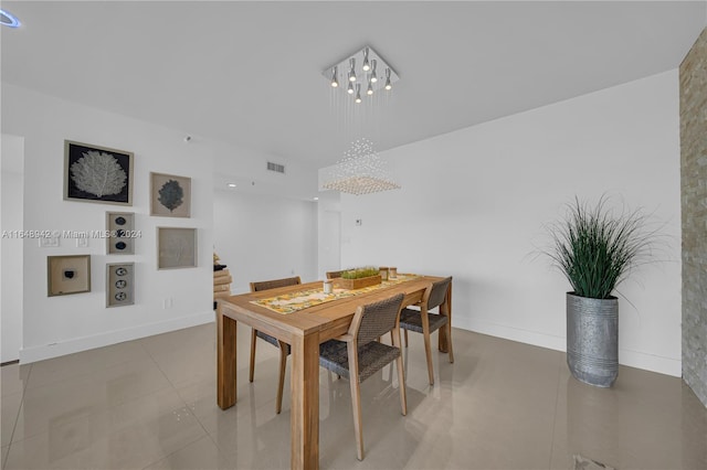 dining area featuring a chandelier