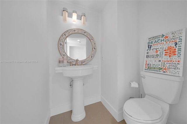 bathroom featuring toilet