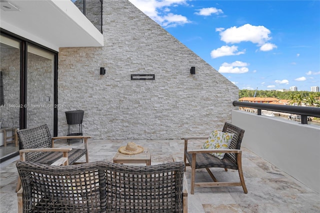 view of patio with a balcony