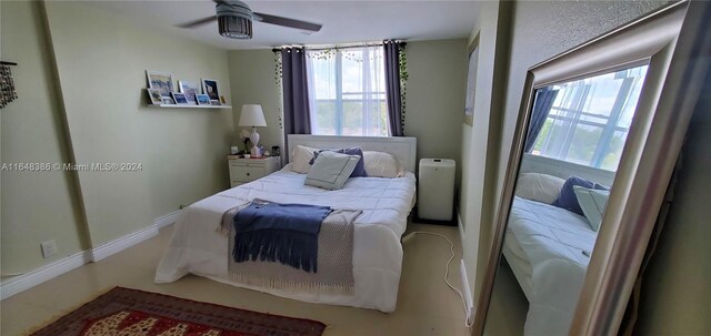 bedroom featuring ceiling fan