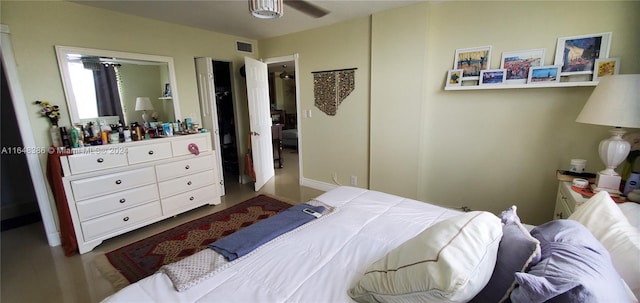 bedroom featuring ceiling fan and hardwood / wood-style flooring