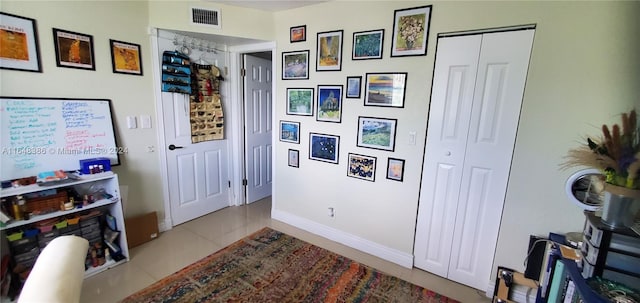 recreation room featuring tile patterned floors