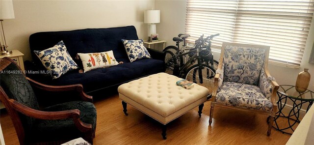 sitting room with hardwood / wood-style floors