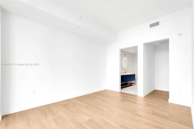 interior space featuring light hardwood / wood-style flooring and sink