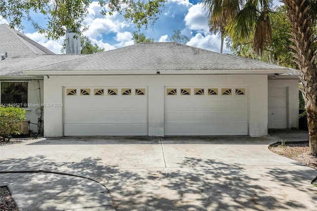 exterior space with a garage