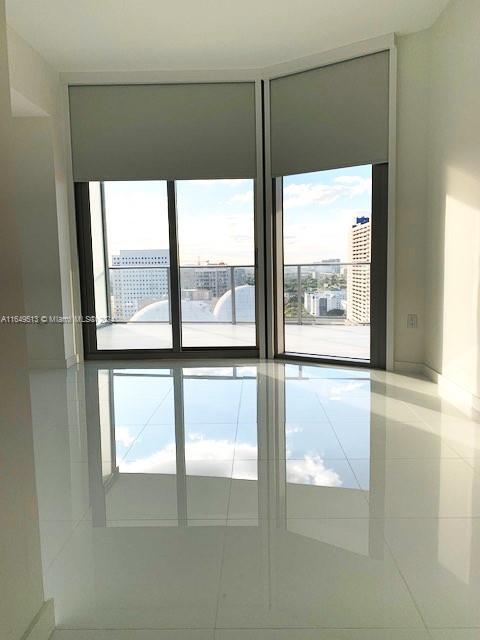 851 NE 1st Ave Unit 2110, Miami, FL 33132 - spare room featuring tile patterned flooring