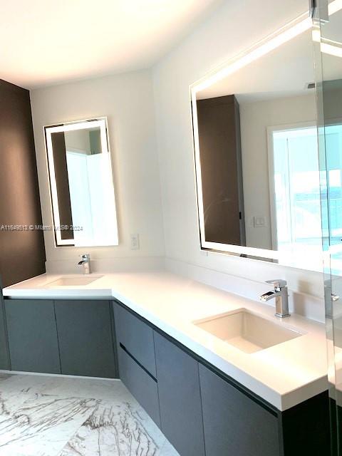 bathroom featuring vanity and tile patterned floors