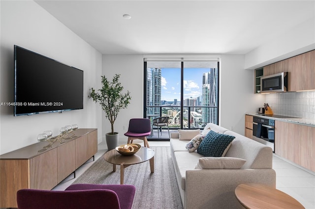 601 NE 1st Ave Unit 3101, Miami, FL 33132 - living area with light tile patterned flooring and a wall of windows