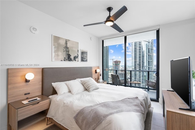 tiled bedroom with floor to ceiling windows, ceiling fan, and access to outside