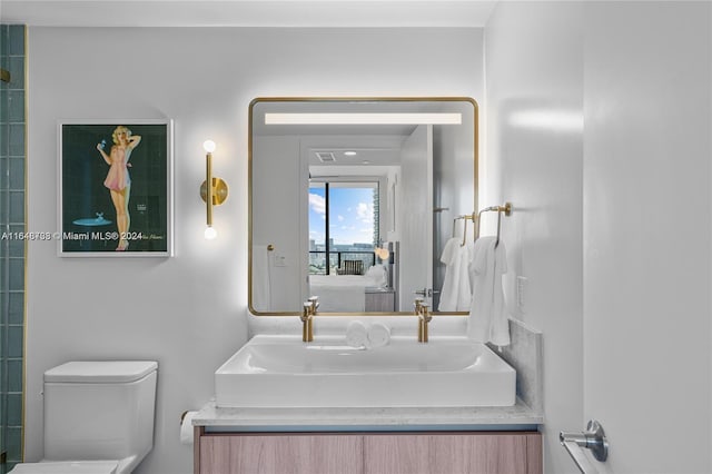 601 NE 1st Ave Unit 3101, Miami, FL 33132 - ensuite bathroom with toilet, vanity, and connected bathroom