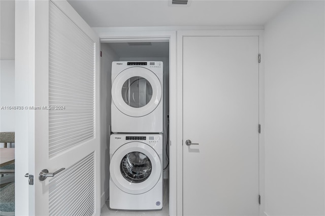 601 NE 1st Ave Unit 3101, Miami, FL 33132 - clothes washing area with stacked washer / dryer and laundry area