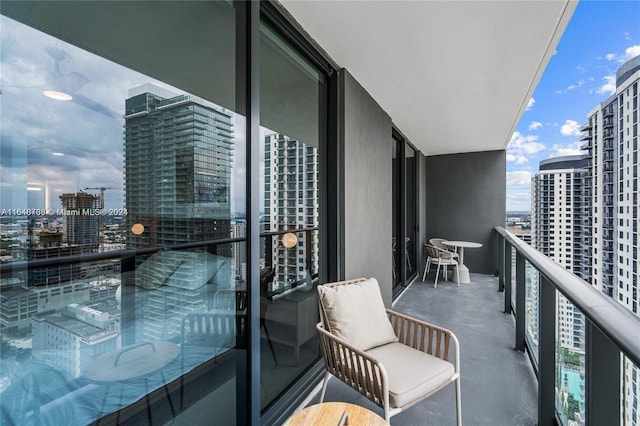 balcony with a hot tub