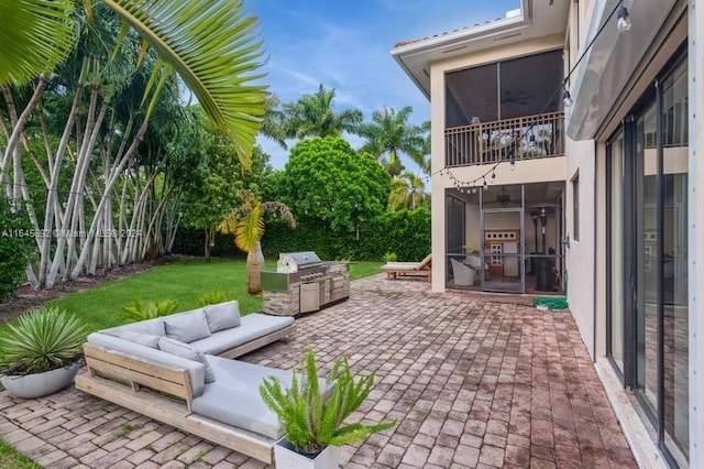 view of patio featuring area for grilling and an outdoor living space