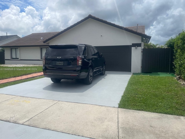 view of side of home featuring a yard