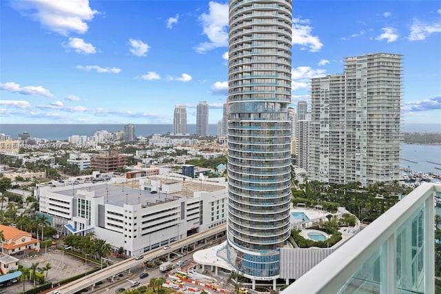 property's view of city featuring a water view