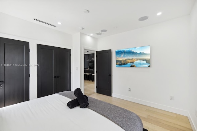 bedroom featuring light hardwood / wood-style flooring