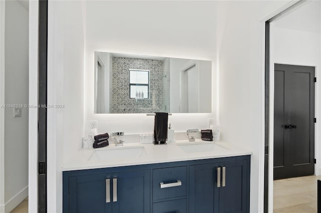 bathroom featuring vanity and hardwood / wood-style floors