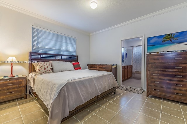 tiled bedroom with ensuite bathroom and ornamental molding
