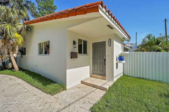 exterior space featuring a lawn