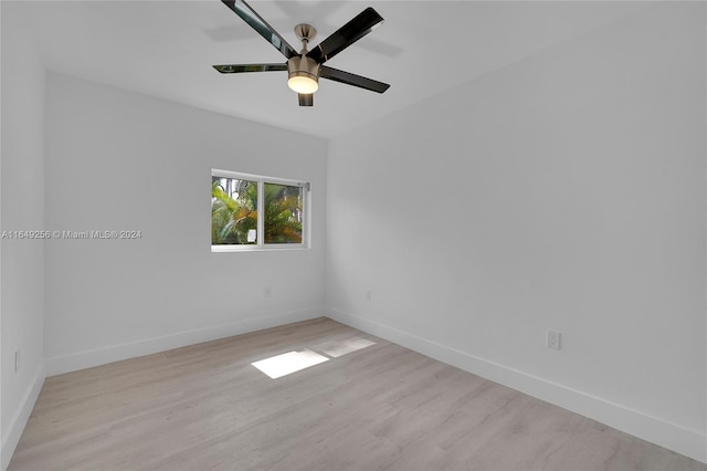 unfurnished room with ceiling fan and light hardwood / wood-style floors