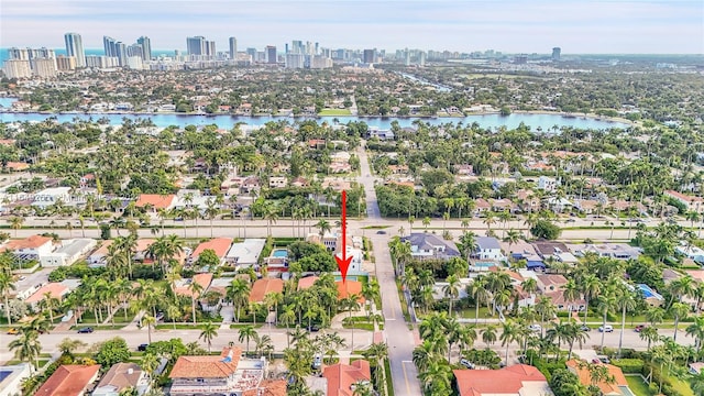 birds eye view of property featuring a water view